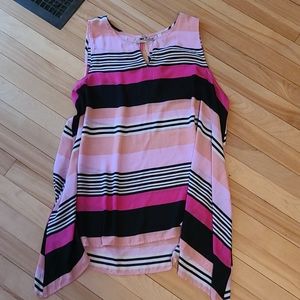 Sheer sleeveless tunic top.